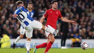 <p>BATTLE: Brighton’s Alexis Mac Allister, left, battles with Nottingham Forest’s Remo Freuler. Pic: Gareth Fuller/PA</p>