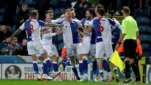 <p>TOP OF THE TREE: Blackburn Rovers' Scott Wharton (centre) celebrates scoring his side second goal during the Sky Bet Championship match at Ewood Park, Blackburn. Pic: Isaac Parkin/PA Wire</p>