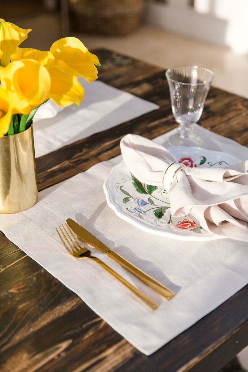  A plain white approach to table linens allows freedom to to tablescape whatever the season, to work beautifully with patterned wares (placemats and napkins €48 for four from The Designed Table).