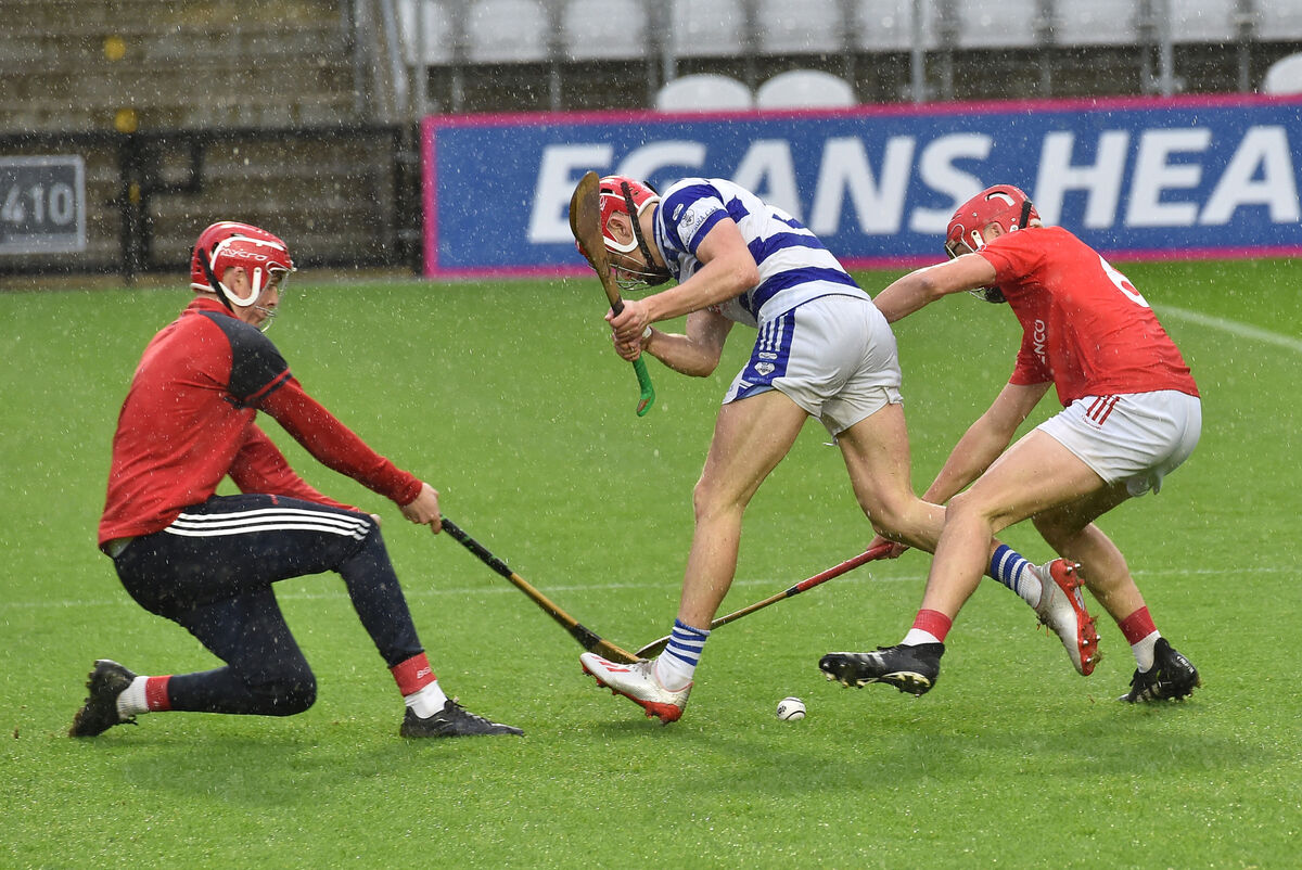 SOFT GOING: Jack Harrington, Inniscarra having his shot on goal blocked by Daragh Joyce and Ciaran Joyce of Castlemartyr last weekend. Picture: Dan Linehan