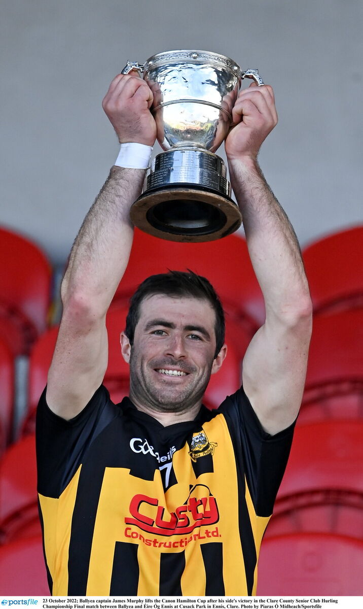 23 October 2022; Ballyea captain James Murphy lifts the Canon Hamilton Cup after his side's victory in the Clare County Senior Club Hurling Championship Final match between Ballyea and Éire Óg Ennis at Cusack Park in Ennis, Clare. Photo by Piaras Ó Mídheach/Sportsfile