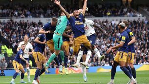 <p>FIRST CONTACT: Newcastle United’s Callum Wilson feels a push in the back during the Premier League match against Tottenham at Tottenham Hotspur Stadium yesterday. Pic: Julian Finney/Getty Images</p>