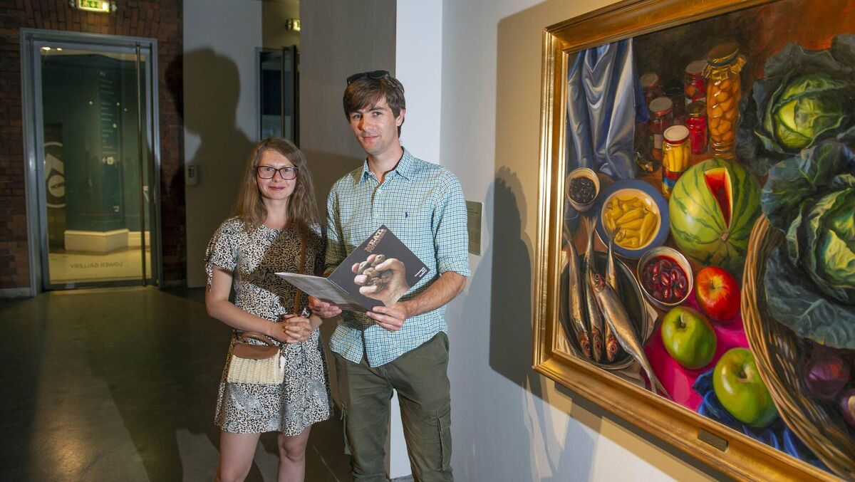 The theme of food, which Meat and Potatoes is hinged upon, is something that any number of people can tap in to in unlimited ways, says Anne. Here, Tatiana Dobromyrska and Adam Stead are pictured at the opening of the exhibition.