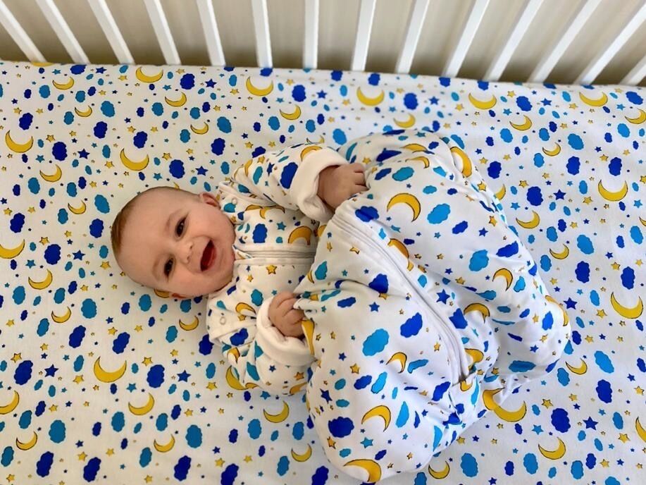 BabyBoo's cotton sleeping bag meets safety guidelines for babies. 