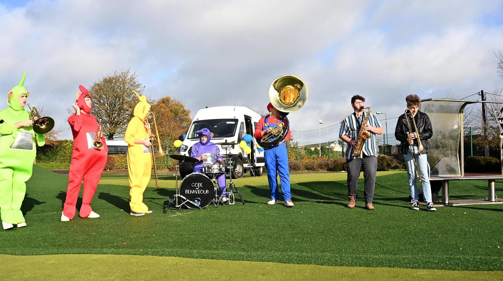 Teletubbies, students, and teachers celebrate new bus paid for with anonymous donor help