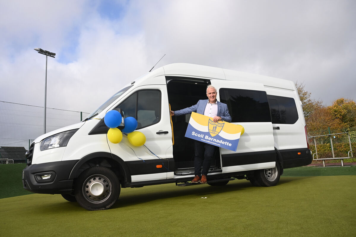  Principal Don Golden with the new Ford Transit 17-seat school bus at Scoil Bernadette, Montenotte