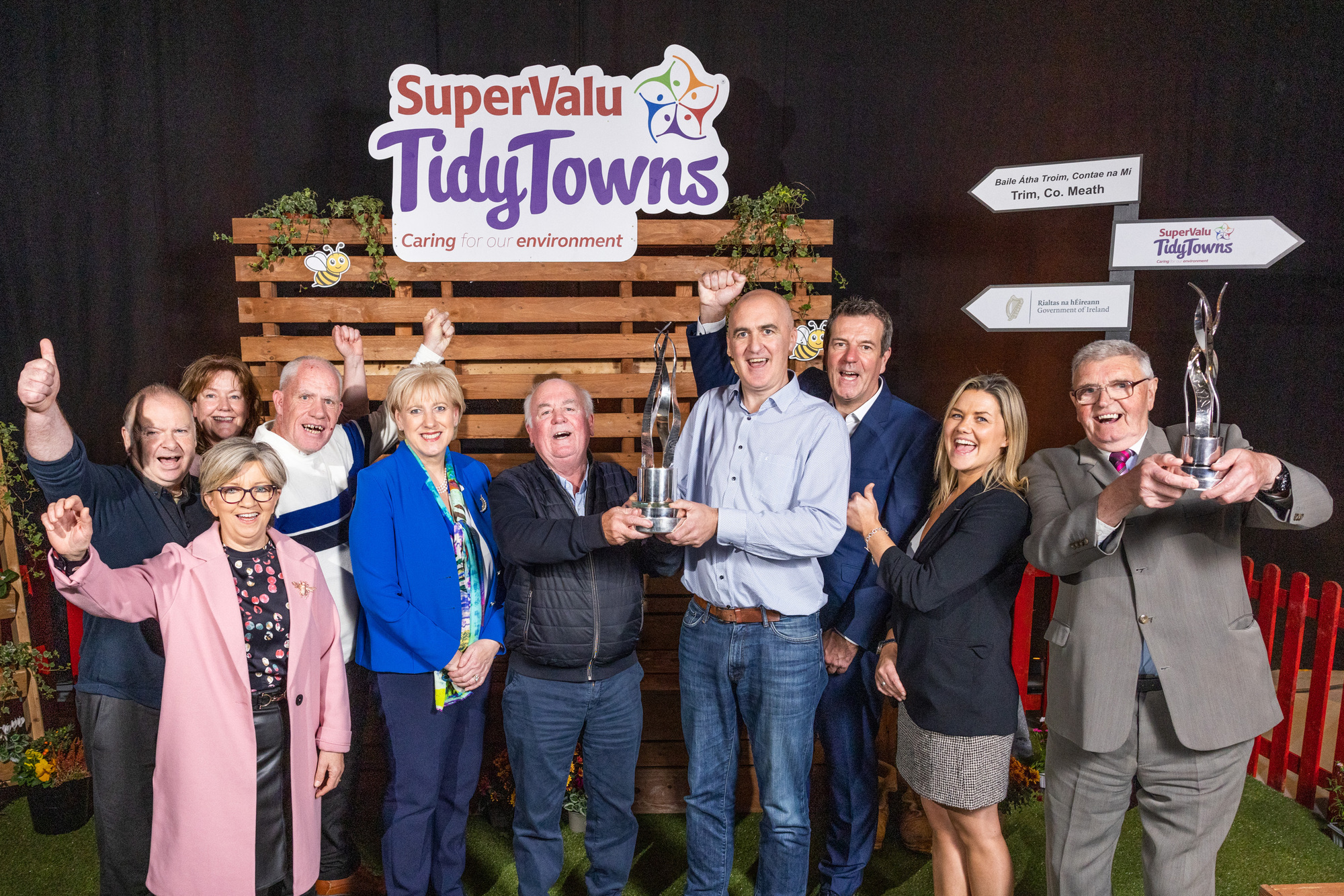  Anthony Conlon and Chairperson Brian Heffernan (holding trophy) with Minister for Rural and Community Development, Heather Humphreys TD (at left); and Ian Allen, Managing Director of SuperValu and Centra (right of centre); along with committee members. Trim was named as the overall winner as well as Tidiest Large Town. Picture: Naoise Culhane