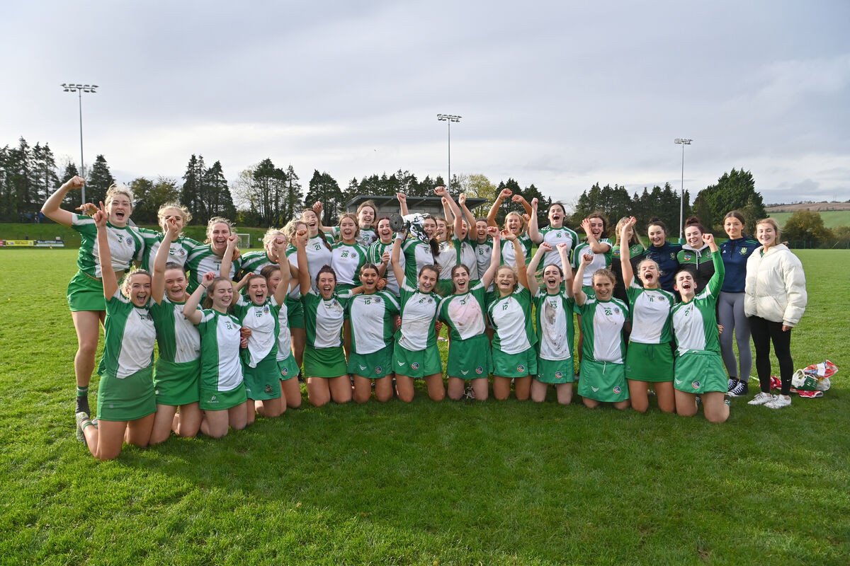 TO THE VICTORS: The Aghabullogue team celebrate their victory over Blackrock in the SE Systems Cork Camogie intermediate club championship final replay at Ovens, Cork. Pic: Dan Linehan