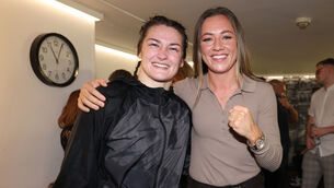 <p>Katie Taylor celebrates after her fight at Wembley on Saturday with Ireland and Arsenal star Katie McCabe.  Picture: INPHO/Matchoom Boxing/Mark Robinson</p>