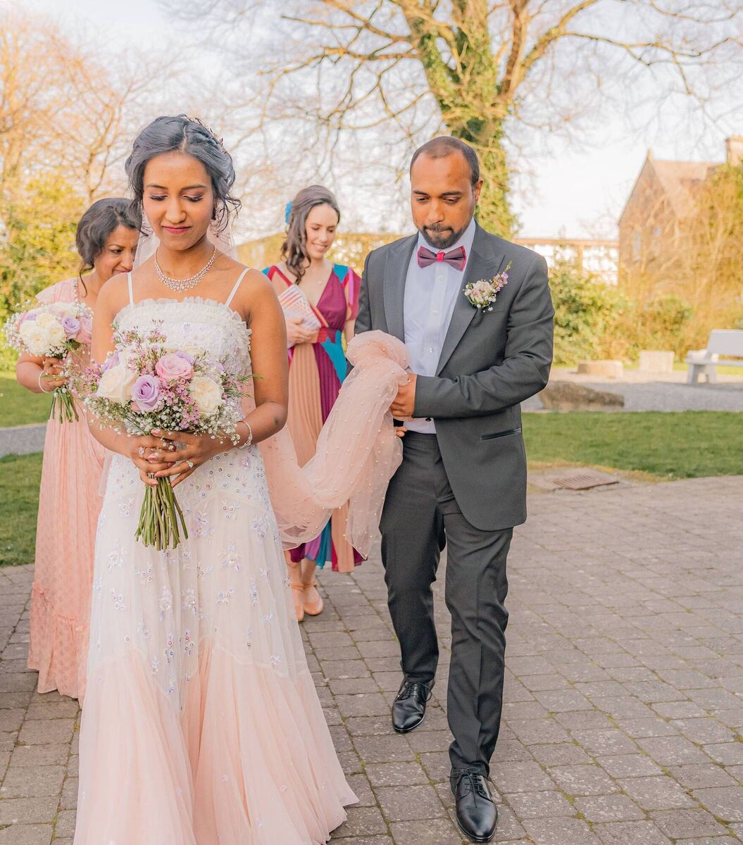 Bhumika Gupta, Anil Kumar Gupta, and Bhumika's mother Kalpana Gupta, who was also her bridesmaid. Pictures: Hugh Noonan