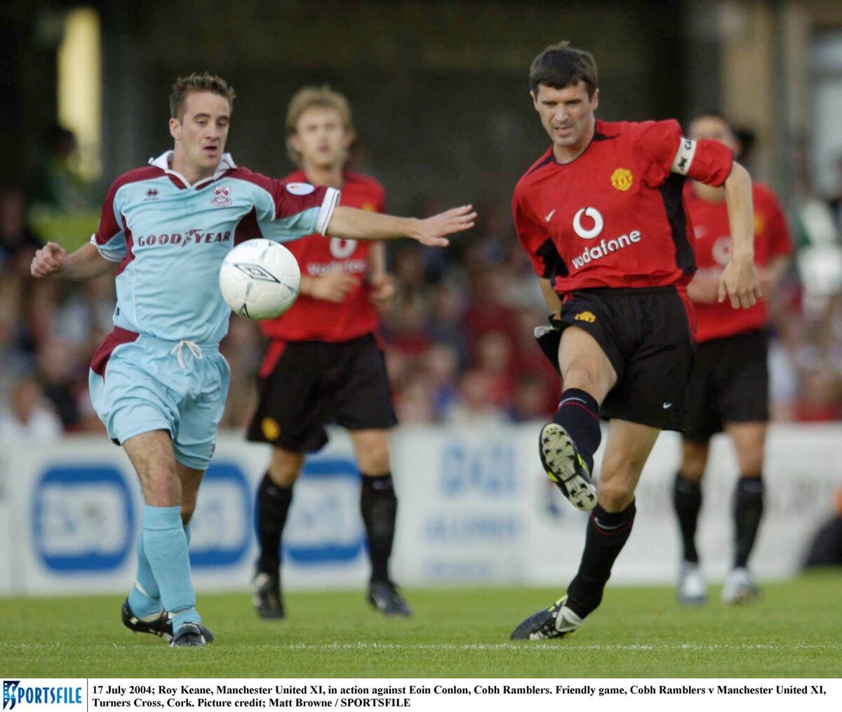 BOSSING MIDFIELD: Roy Keane, Manchester United XI, in action against Eoin Conlon, Cobh Ramblers. . Pic; Matt Browne / SPORTSFILE