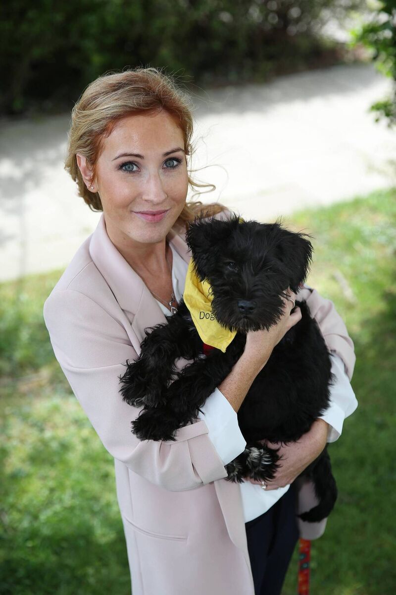 Ciara Murran of Dogs Trust Ireland, with communications assistant in arms Ciara Murran of Dogs Trust Ireland, with communications assistant in arms