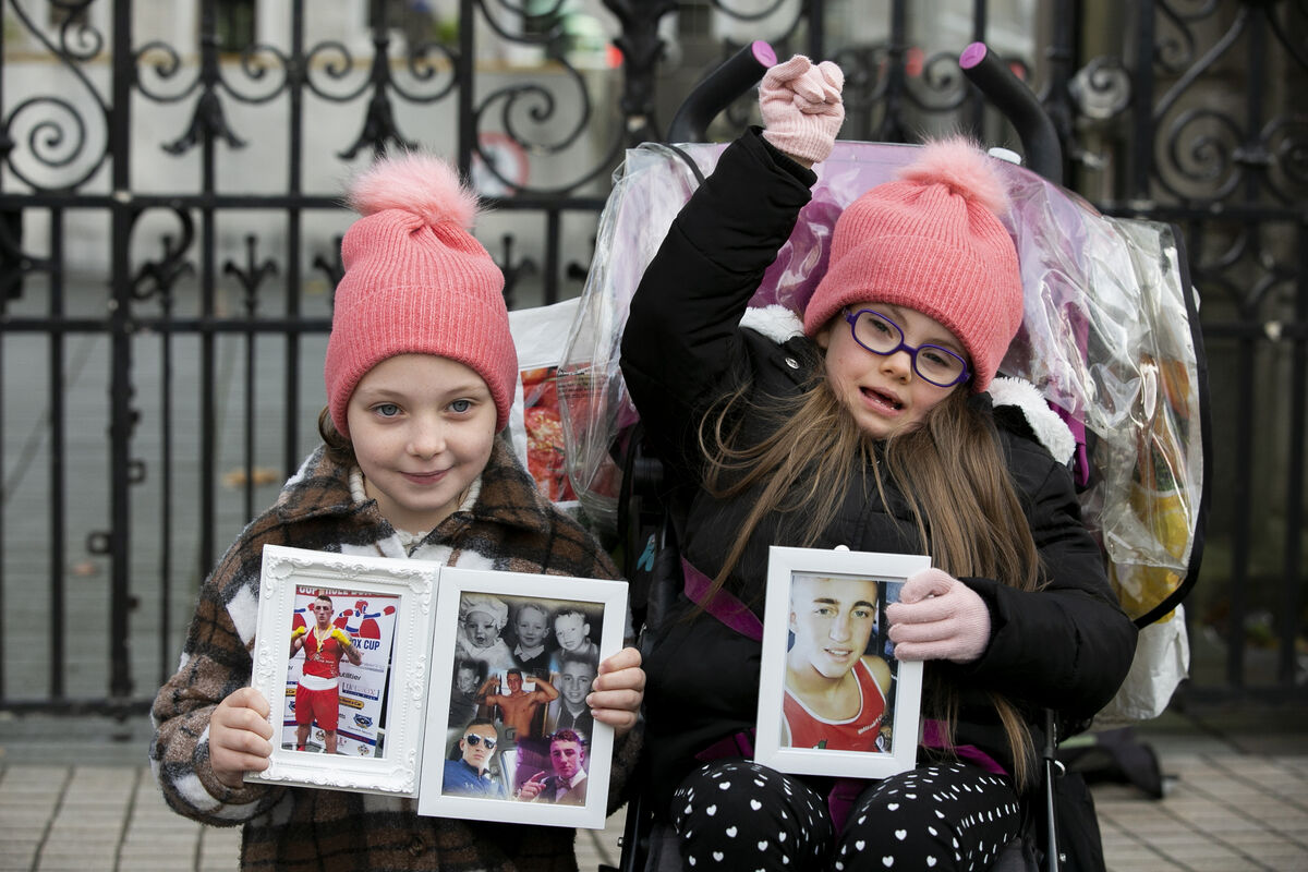 Kevin Sheehy's cousins Bella Rose Rae Boyle, 7, and Layla Rose Hogan, 11, both from Limerick, at Friday's protest. Picture: Gareth Chaney/ Collins Photos