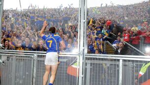 <p>RUNNING UP THAT HILL: Padraic Maher celebrates in front of Tipperary fans on Hill 16 after the match. Picture: INPHO/Cathal Noonan</p>