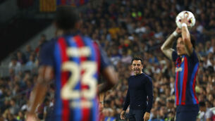 <p>X FACTOR: Barcelona's head coach Xavi Hernandez, centre, gives instructions from the side line at the Camp Nou. Picture: AP Photo/Joan Monfort</p>