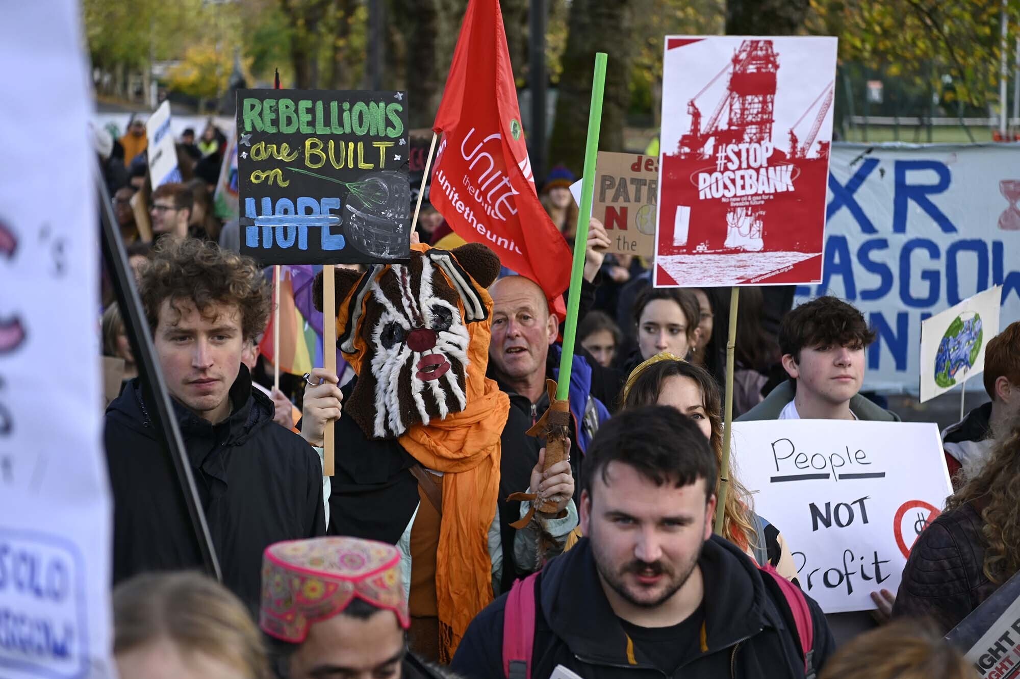 Demonstrators take part in the Fridays for Future Scotland march through Glasgow ahead of the first anniversary of the Cop26 summit in Glasgow. Picture date: Friday October 28, 2022. PA Photo.