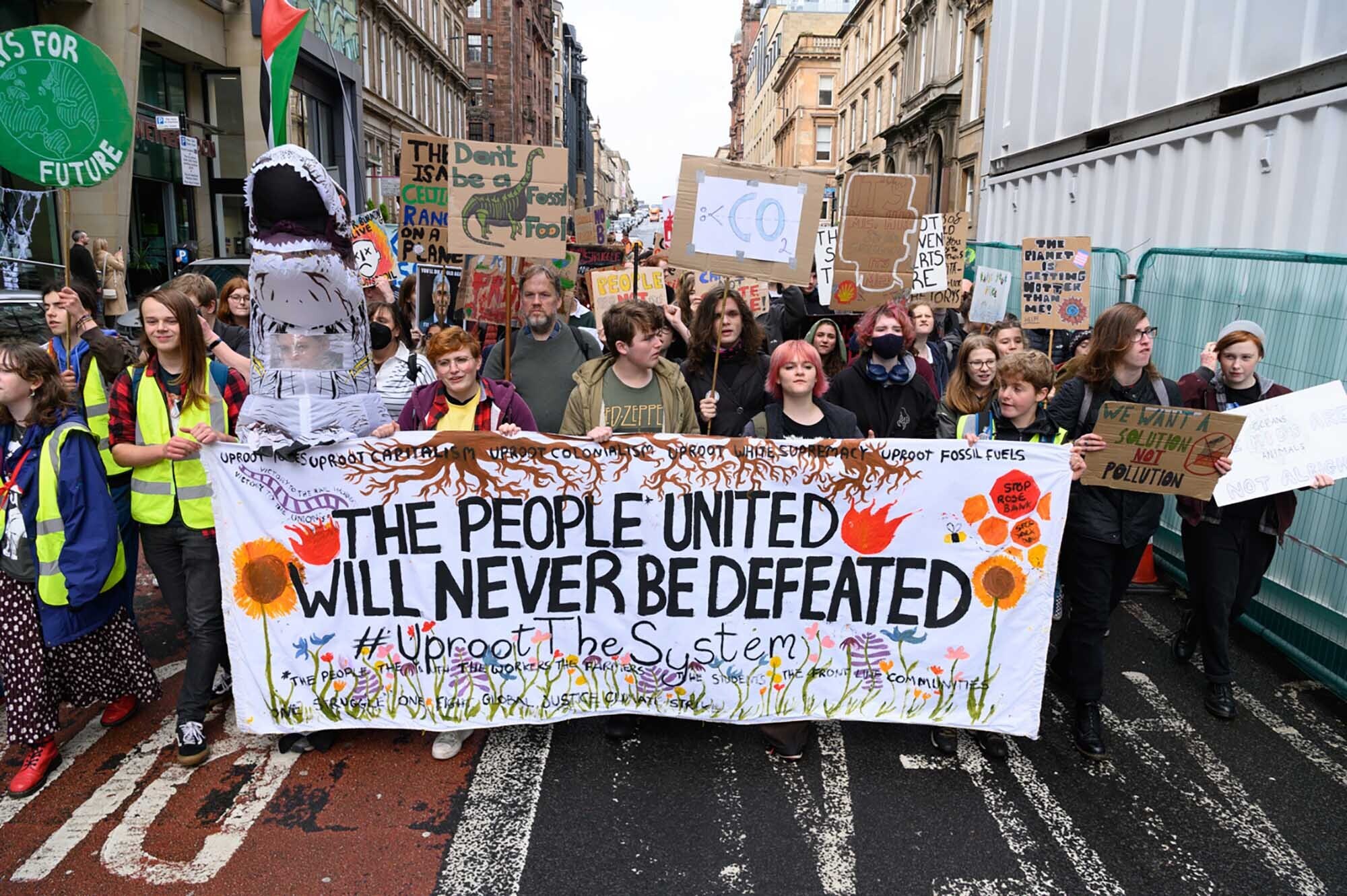 Demonstrators take part in the Fridays for Future Scotland march through Glasgow ahead of the first anniversary of the Cop26 summit in Glasgow. Picture date: Friday October 28, 2022. PA Photo.