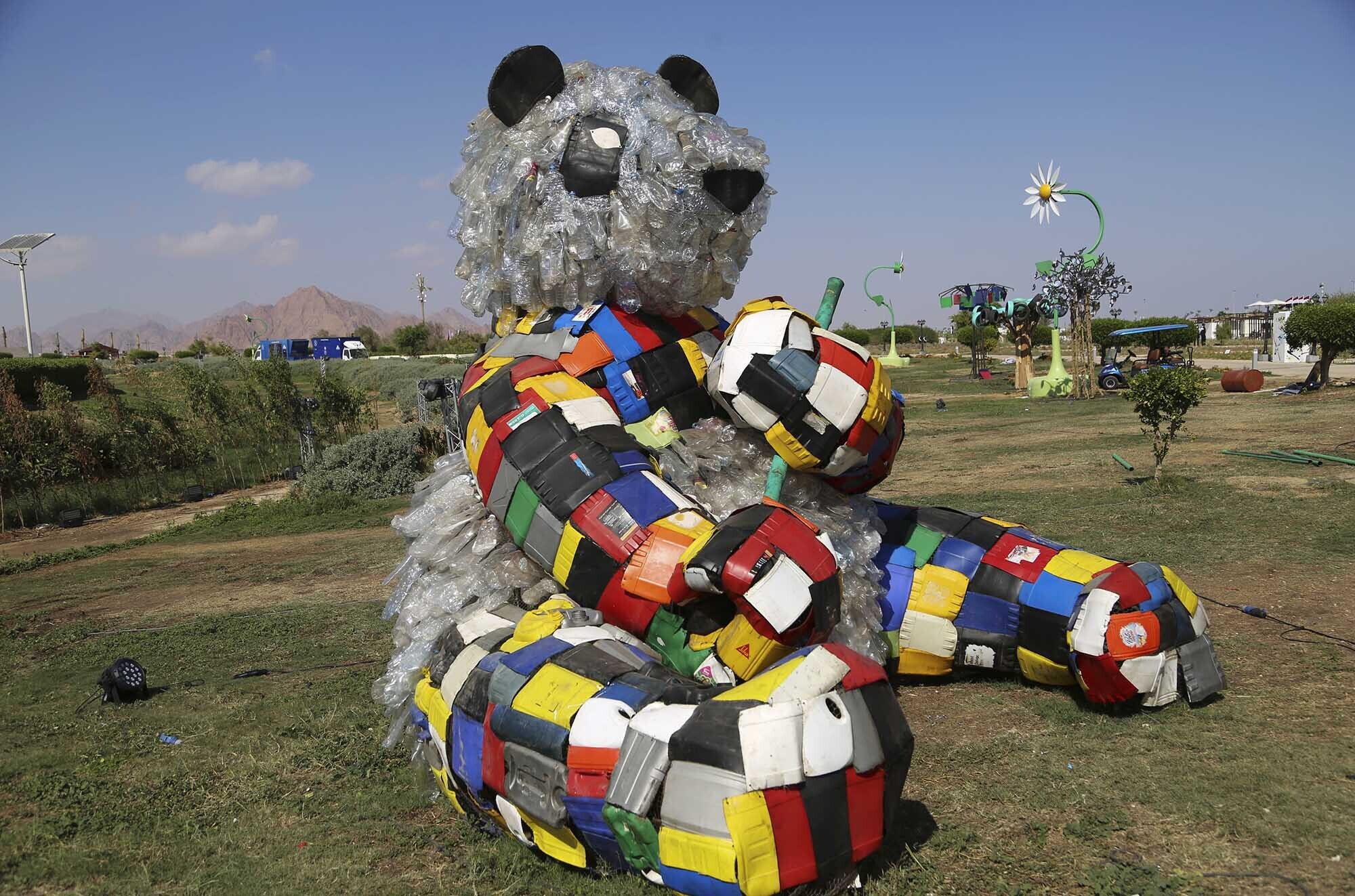 An installation drawing attention to waste made from plastic material is on display in the Green Zone of the U.N. COP27 Climate Summit in Sharm el-Sheikh, Egypt, Monday, Nov. 7, 2022.