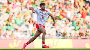 <p>FULL FLIGHT: Conor McKenna celebrates scoring for Tyrone. Picture: INPHO/Ryan Byrne</p>