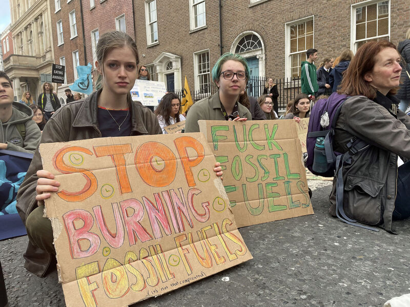 A climate change protest organised by students at Trinity College Dublin is held outside Leinster House in Dublin. Speakers criticised inaction by the Irish Government and the Cop27 UN climate summit being held in Egypt this week. Picture: Grainne Ní Aodha/PA Wire A climate change protest organised by students at Trinity College Dublin is held outside Leinster House in Dublin. Speakers criticised inaction by the Irish Government and the Cop27 UN climate summit being held in Egypt this week. Picture: Grainne Ní Aodha/PA Wire