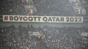 <p>A banner reads "boycott Qatar 2022" on the tribune during the German Bundesliga soccer match between FC Schalke 04 and Bayern Munich in Gelsenkirchen on Saturday. Picture: AP Photo/Martin Meissner</p>