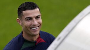 <p>NARCISSISTIC TENDANCIES: Cristiano Ronaldo smiles as he arrives for a Portugal soccer team training session in Oeiras, outside Lisbon. Pic: AP Photo/Armando Franca</p>
