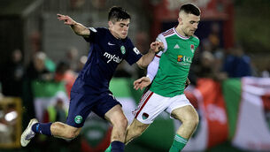 <p>STAR BOY: Cork City's Aaron Bolger and Josh McGlone of the Bray Wanderers.</p>