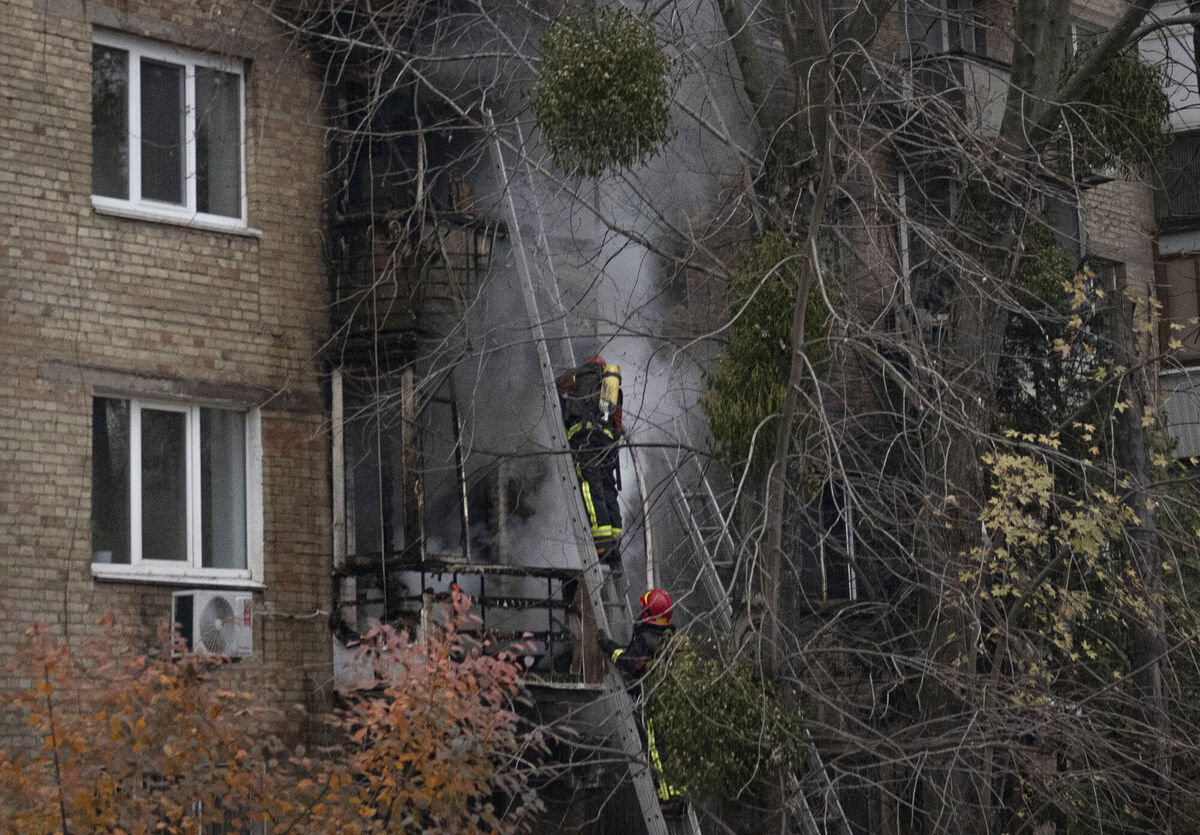 Ukrainian State Emergency Service firefighters work to extinguish a fire at the scene of a Russian shelling in Kyiv, Ukraine, Tuesday, Nov. 15, 2022. Picture: AP Photo/Andrew Kravchenko Ukrainian State Emergency Service firefighters work to extinguish a fire at the scene of a Russian shelling in Kyiv, Ukraine, Tuesday, Nov. 15, 2022. Picture: AP Photo/Andrew Kravchenko
