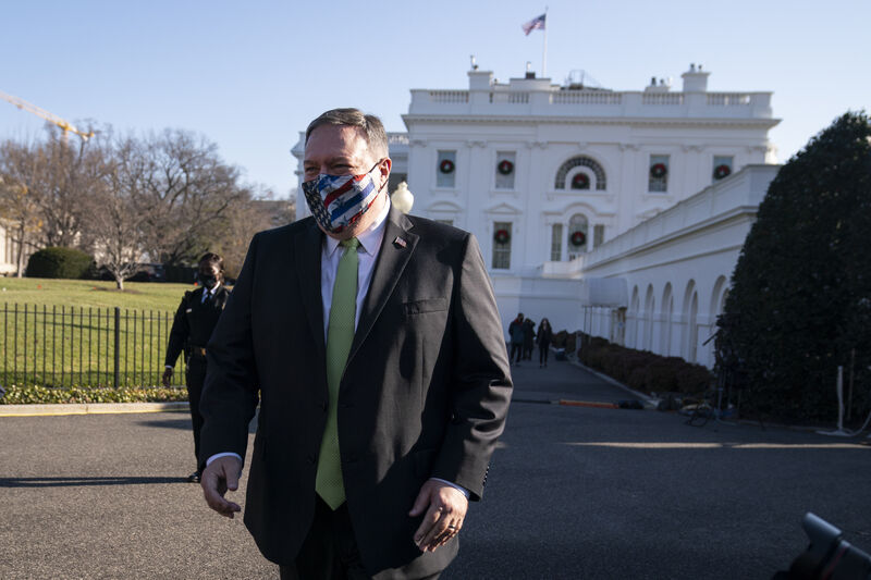 Former secretary of state Mike Pompeo visits the White House with family members, Friday, Dec. 11, 2020, in Washington. (AP Photo/Evan Vucci)