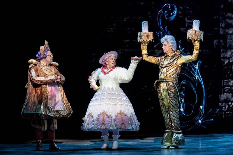 Nigel Richards as Cogsworth, Sam Bailey as Mrs Potts and Alyn Hawke as Lumiere