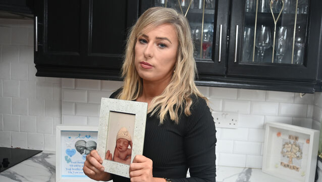 <p>Leona Bermingham at her home, with a photo of her deceased child, twin baby Lee. Lee died on September 18, 2019, hours after she had given birth to him and twin brother Lewis by emergency caesarean at 33 weeks. Picture: Larry Cummins</p>
