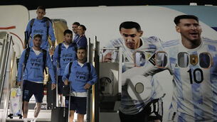 <p>TOUCHING DOWN: Lionel Messi, top right, of Argentina's national soccer team arrives with teammates at Hamad International airport in Doha THIS WEEK. Picture: AP Photo/Hassan Ammar</p>