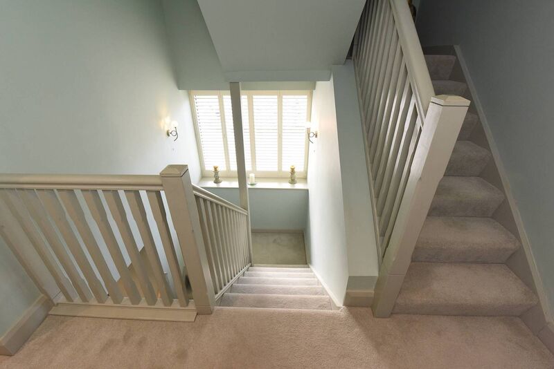 Plantation shutters on every window, including the south facing gable break-out on the stair return