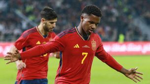 <p>Spain's forward Ansu Fati (R) celebrates scoring during the friendly against Jordan. Picture: KHALIL MAZRAAWI/afp/AFP via Getty Images)</p>