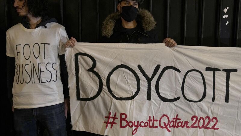 Activists protest against the World Cup which starts Sunday in Qatar, and called for a boycott in a demonstration outside the Qatar Embassy in Paris. Picture: Francois Mori/AP. Activists protest against the World Cup which starts Sunday in Qatar, and called for a boycott in a demonstration outside the Qatar Embassy in Paris. Picture: Francois Mori/AP.