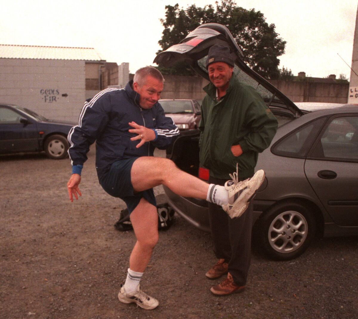 LEGENDS: The late Michael Ellard arrives at Kerry training as the great Paidi O Sé warms up. Picture: Des Barry