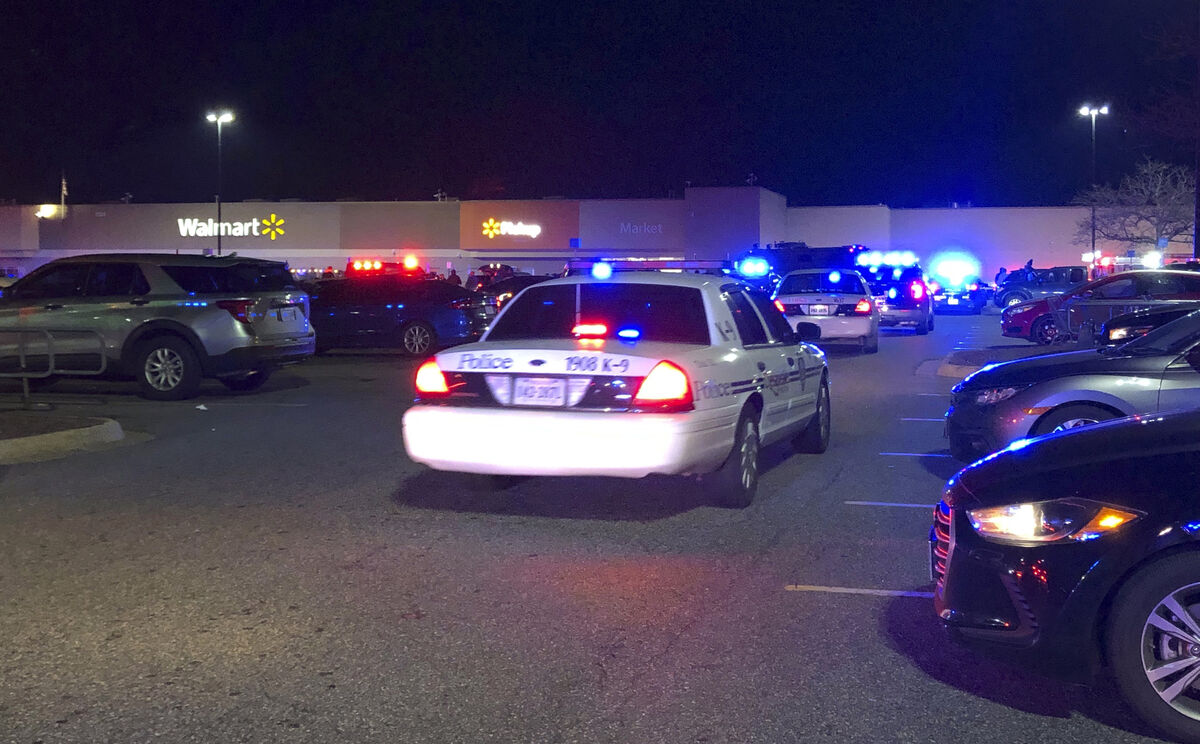 Officers responded to a report of a shooting at the Walmart on Sam’s Circle around 10.15pm local time. Picture: WAVY-TV 10 via AP Officers responded to a report of a shooting at the Walmart on Sam’s Circle around 10.15pm local time. Picture: WAVY-TV 10 via AP