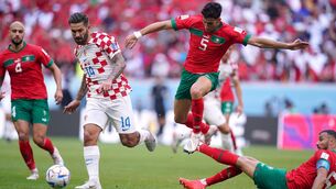 <p>Croatia’s Marko Livaja (left) battles for the ball with Morocco's Nayef Aguerd and Romain Saiss (right) during the FIFA World Cup Group F match at the Al Bayt Stadium, Al Khor, Qatar. Picture Adam Davy/PA Wire.</p>