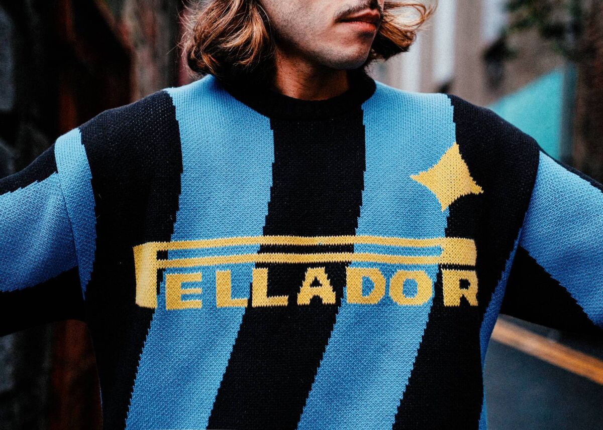 Front design of Pellador's 'Milan' knit, inspired by 1990s jerseys sported by Italian soccer team Inter Milan Front design of Pellador's 'Milan' knit, inspired by 1990s jerseys sported by Italian soccer team Inter Milan