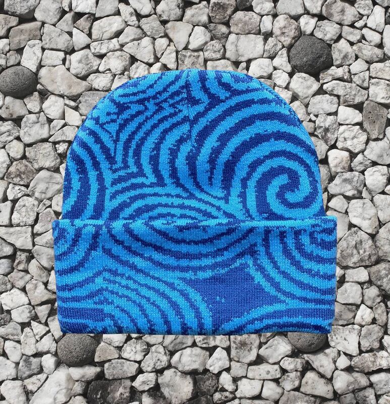 A look at one of Execute Exist's new beanies, inspired by spiral carvings at Newgrange