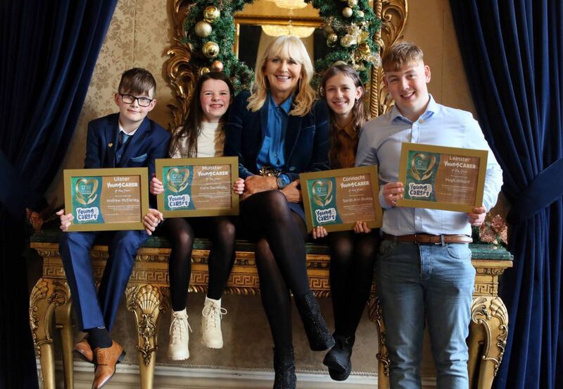 Miriam O'Callaghan with this year's Young Family Carers Andrew McEleney, 13, Cara Darmody, 12, Sarah Ann Buday, 13, and Hugh Hilliard, 17. Miriam O'Callaghan with this year's Young Family Carers Andrew McEleney, 13, Cara Darmody, 12, Sarah Ann Buday, 13, and Hugh Hilliard, 17.