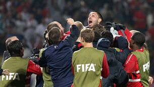 <p>DEMPSEY THEN: Clint Dempsey celebrates his game-tying goal against England with the USA bench in 2010. Picture: Andy Mead/YCJ/Icon SMI/Icon Sport Media via Getty Images</p>