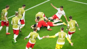 <p>FINALLY: Poland’s Robert Lewandowski celebrates scoring their side's second goal at the Education City Stadium in Doha.</p>