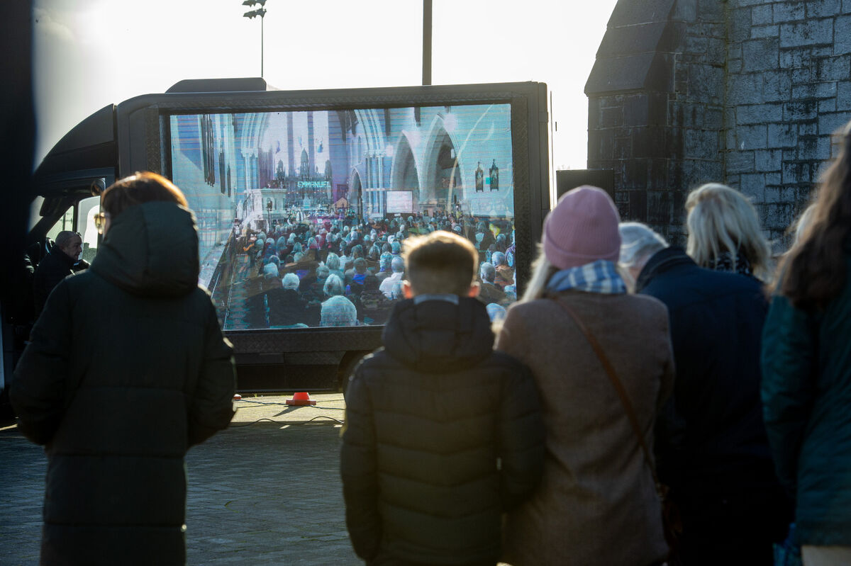  People watching the big screen outside the church at the memorial celebration for the late Vicky Phelan at the Church of the Assumption, Mooncoin, Kilkenny. Picture Dan Linehan