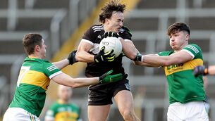 <p>STARRING ROLE: Newcastle West's Cian Sheehan with Padraic Looram and Conall Kennedy of the Clonmel Commercials. Pic: INPHO/Laszlo Geczo</p>