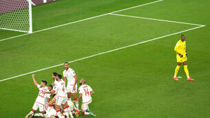 <p>Tunisia's Wahbi Khazri (hidden) celebrates scoring. Pic: Jonathan Brady/PA Wire.</p>