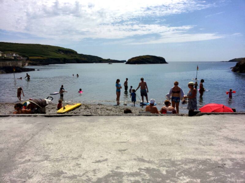 The annual Christmas swim in 2021 run by Skibbereen Rowing Club at Tragumna near Skibbereen, West Cork, with Drishane Island in the background." Picture: Garry Minihane