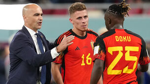 <p>FULL TIME: Belgium manager Roberto Martinez with Jeremy Doku (right) and Thorgan Hazard. Picture: Nick Potts/PA Wire.</p>