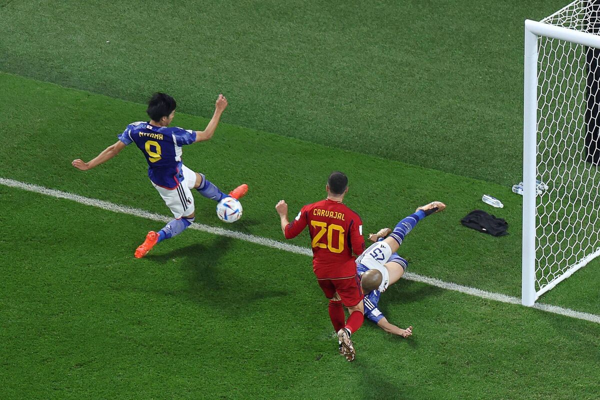 GAME OF INCHES: Japan's forward Kaoru Mitoma crosses the ball for his team's winner. Picture: GIUSEPPE CACACE/AFP via Getty Images