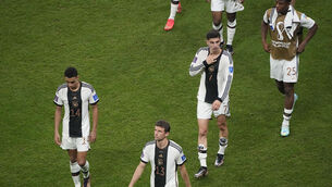 <p>REGRETS: Germany's team players leave the pitch after their World Cup elimination. (AP Photo/Ariel Schalit)</p>